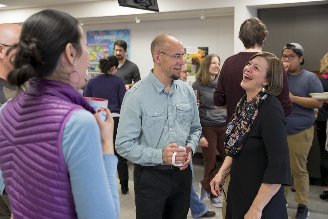 Cheryl Gombas talks with Brian Lazzaro. 
