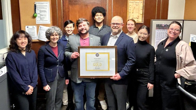 Members of the CUSD Sustainable City team attended an award recognition ceremony at a Ithaca Common Council meeting on March 5 that celebrated the city’s LEED Gold certification. Pictured from left: Vindi Shuhe Wang, MEng ’25, lecturer and project advisor Sirietta Simoncini, Jin Watanabe ’27, Ithaca Mayor Robert Cantelmo, Kendyl Flourney ’27, Tetra Tech senior project manager Sean O’Brien, Savannah Vega, sustainability planner for the city of Ithaca, Jiayi Guo ’26 and Rebecca Evans, director of sustainabili