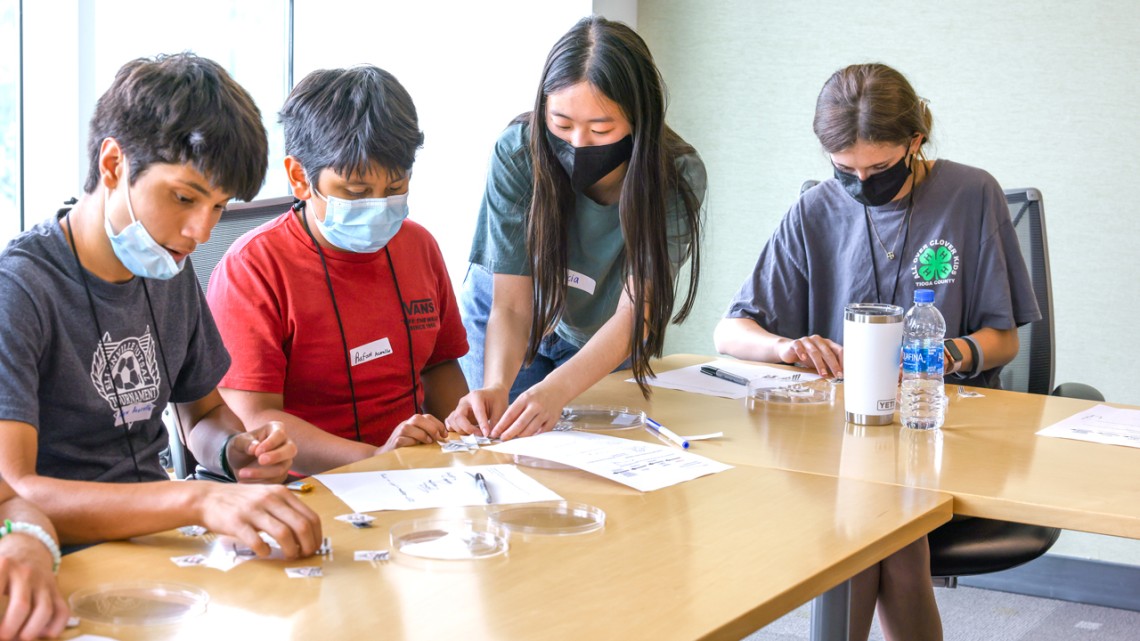 Alicia Chu and middle school students
