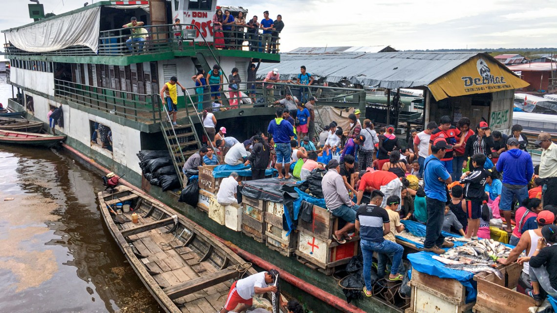A ferry carrying passengers and cargo