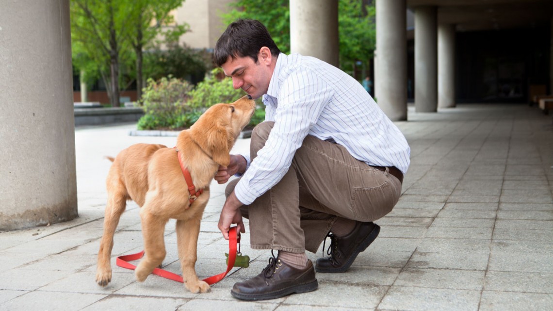 Adam Boyko and puppy