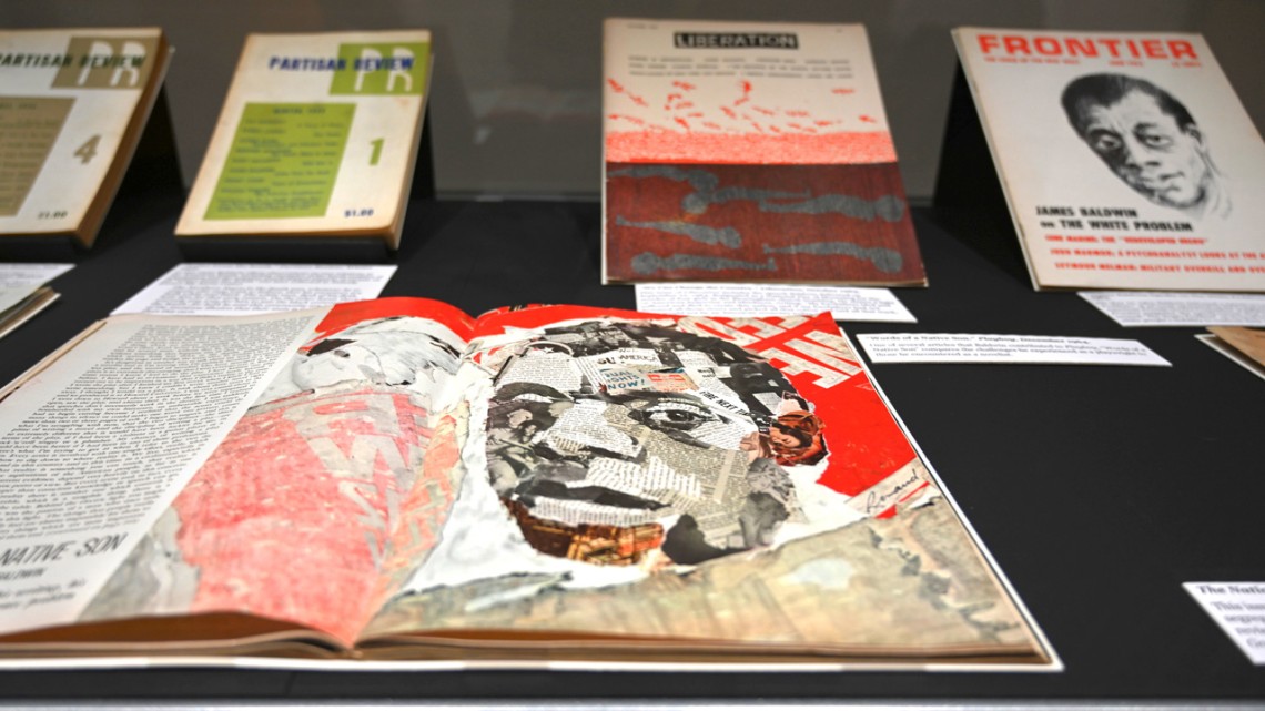 Closeup of a display of James Baldwin’s publications, including magazine articles, ephemera, and rare editions in an exhibit at Carl A. Kroch Library of Cornell University Library.