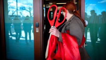 Giant scissors are at the ready for a ribbon cutting at Atkinson Hall